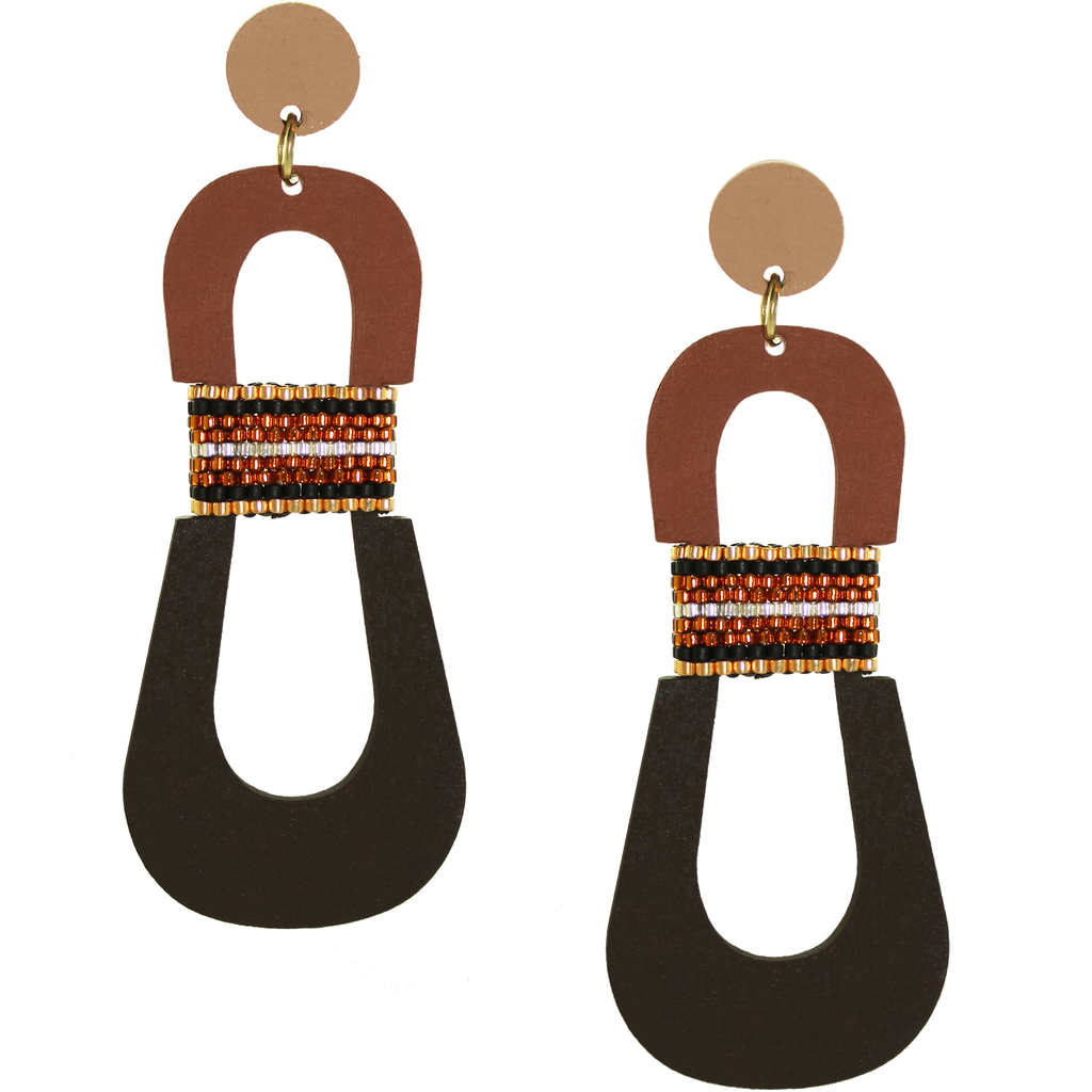 Modern, curvy, color blocked neutral tone statement earrings with hand-beaded accents by the brand SCOTCHBONNET.