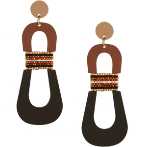 Modern, curvy, color blocked neutral tone statement earrings with hand-beaded accents by the brand SCOTCHBONNET.