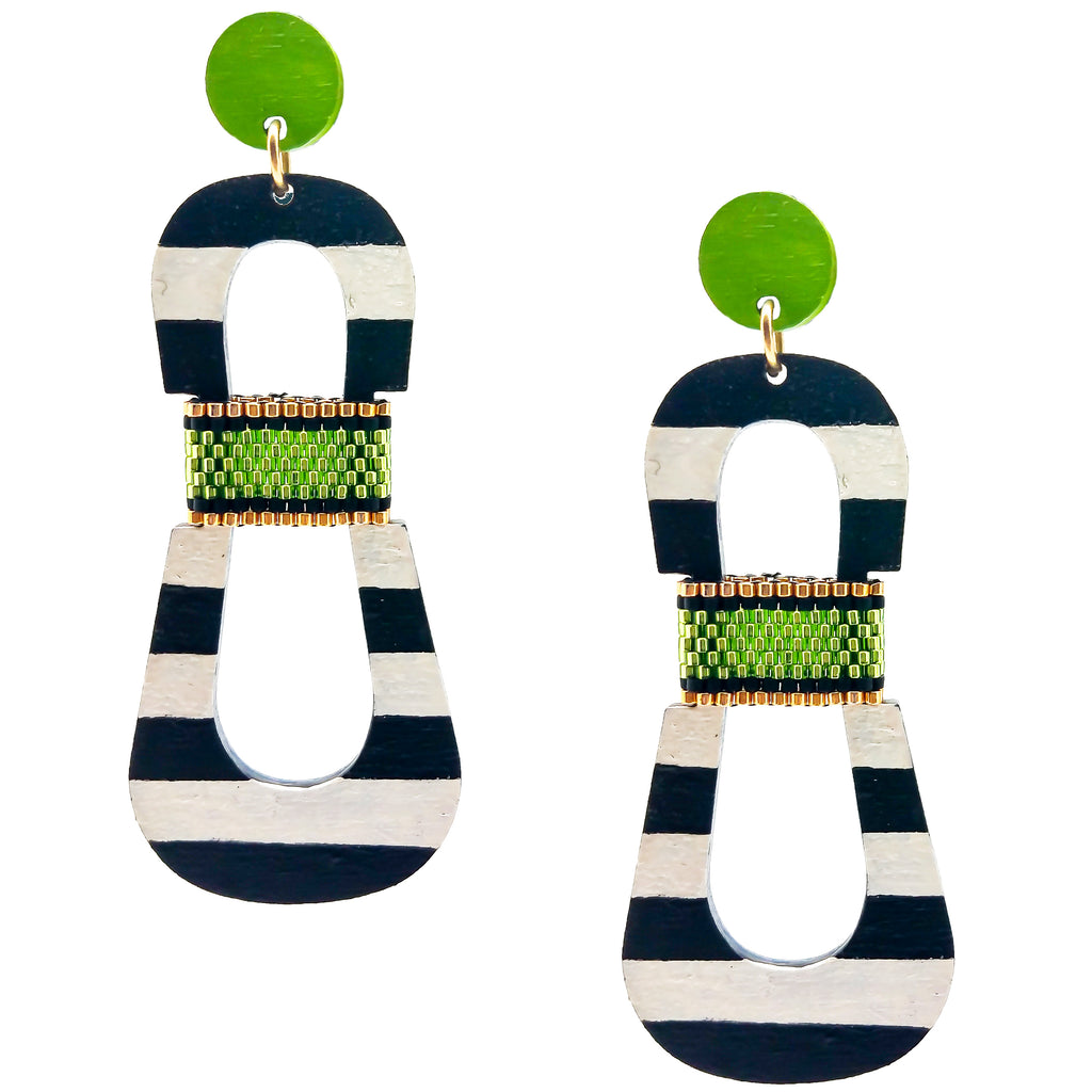 Modern, curvy, black and white striped statement earrings with hand-beaded chartreuse accents by the brand SCOTCHBONNET.