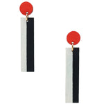 Geometric orange, white, and black color blocked statement earrings by the brand SCOTCHBONNET.